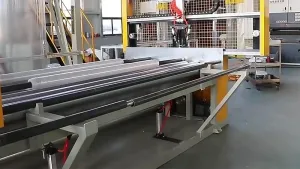Enrollador y cambio de rollo automático